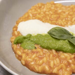 SOZZAGO (NO), ITALY - JULY 15

Tomato risotto with basil and burrata sauce. It is one of chef Claudia Fonio's favourite dishes because as a child it was one of the dishes her father always prepared for her. 

Photo by Davide Bertuccio for The Washington Post