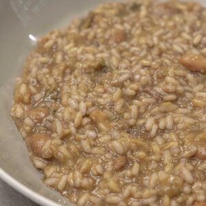 SOZZAGO (NO), ITALY - JULY 15

A photo of the "paniscia". It is the typical risotto of the Novara area. It is a dish made with beans, salami and lard. It is a risotto that is blended with red wine, unlike almost all others that are blended with white wine.

Photo by Davide Bertuccio for The Washington Post